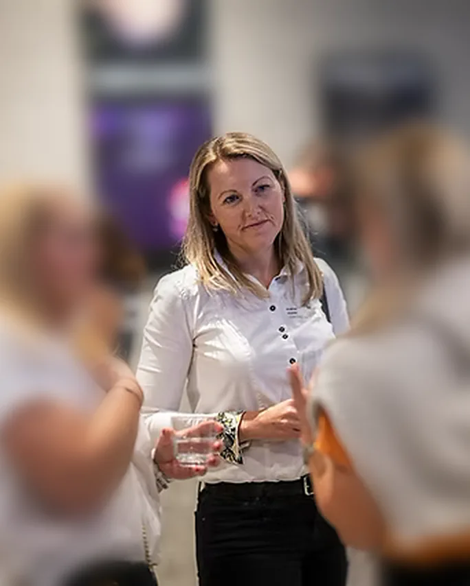 Andrea Hynes at a meetup of finance professionals
